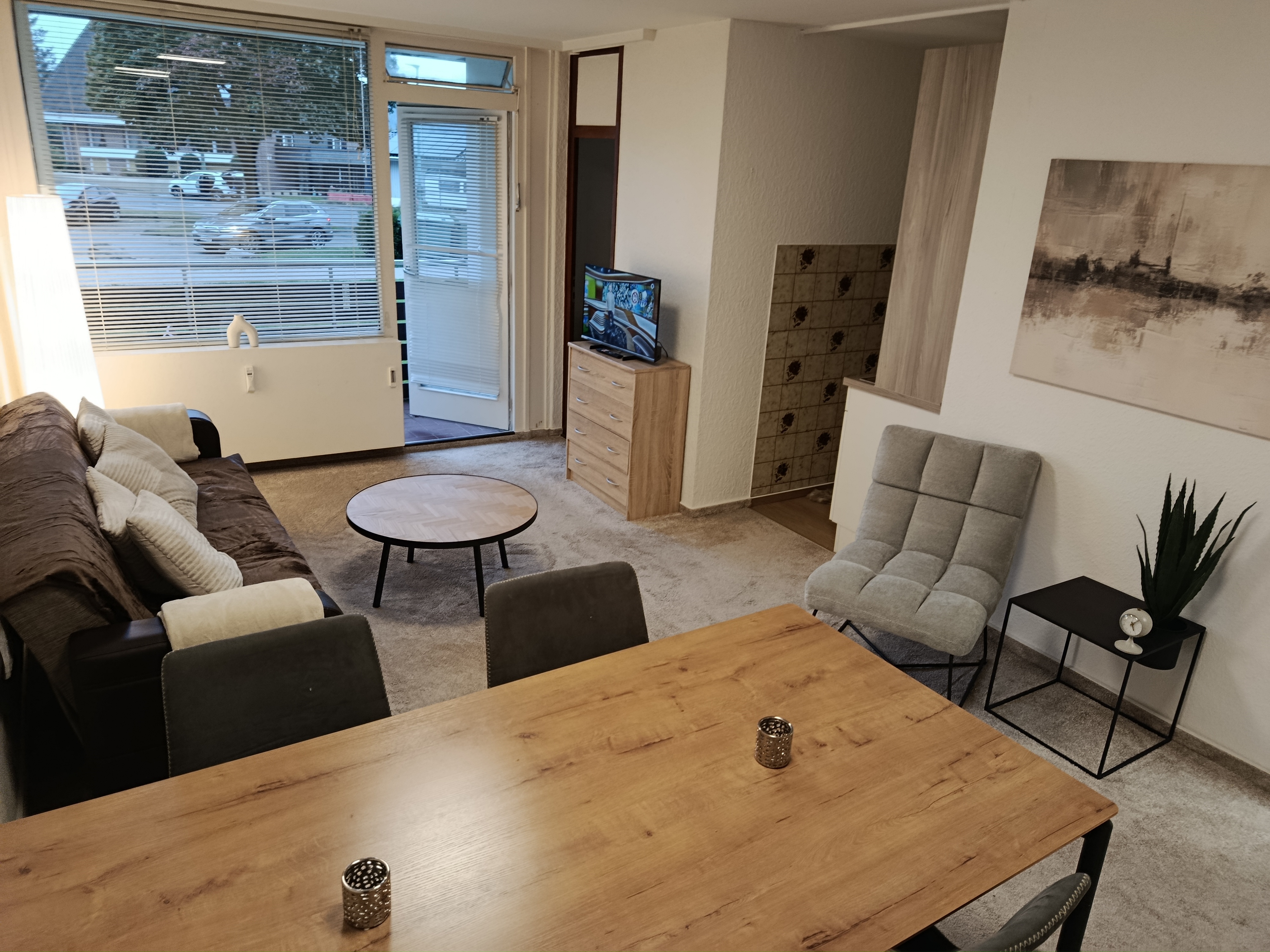 Wohnzimmer mit Balkonzugang – Ferienwohnung Altenau Oberharz